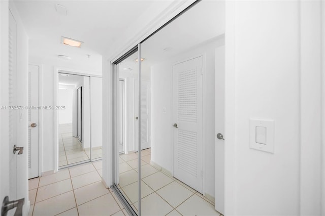 5601 Collins Ave Unit 1604, Miami Beach, FL 33140 - corridor with light tile patterned flooring