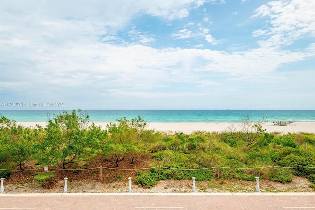 5601 Collins Ave Unit 1604, Miami Beach, FL 33140 - water view with fence and a view of the beach