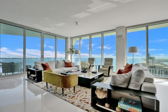 sunroom / solarium with a water view