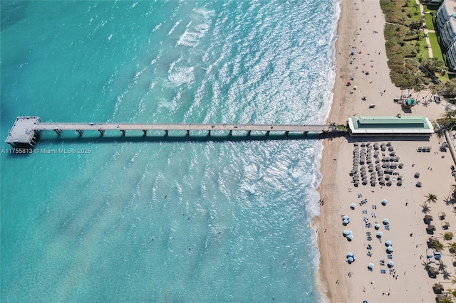 aerial view featuring a beach view and a water view