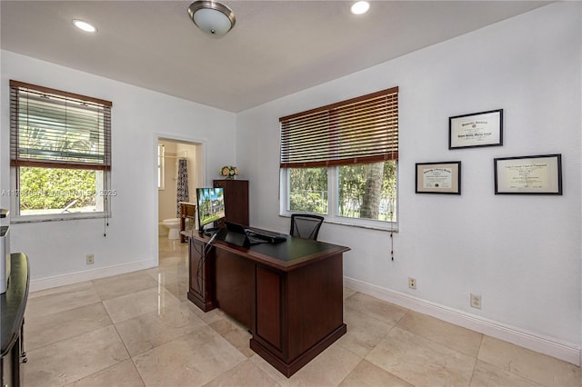 home office with recessed lighting and baseboards