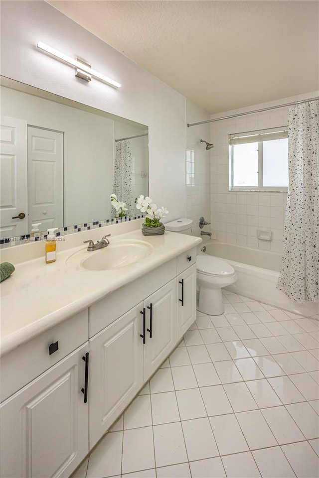 bathroom with vanity, a textured ceiling, tile patterned floors, toilet, and shower / tub combo with curtain