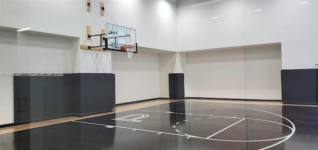 view of basketball court featuring basketball hoop