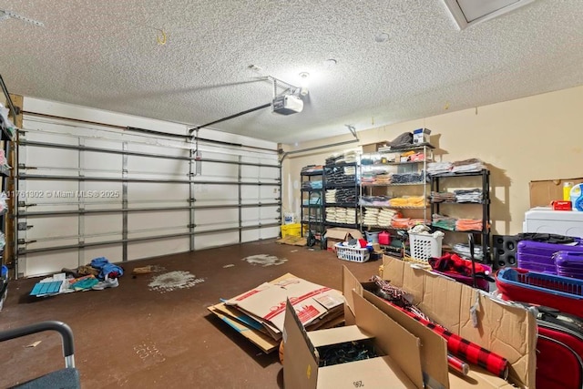 garage with washer / clothes dryer and a garage door opener