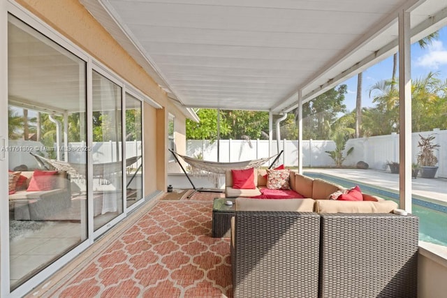 sunroom / solarium featuring a wealth of natural light