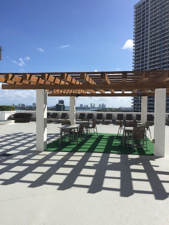 view of patio featuring a pergola