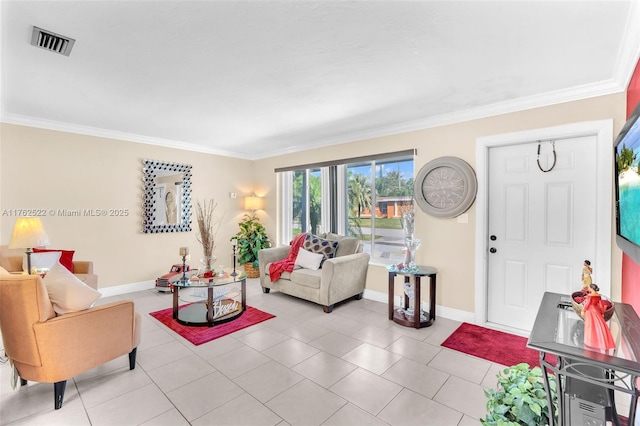 living room with light tile patterned floors, visible vents, baseboards, and ornamental molding