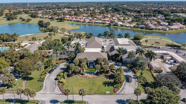 birds eye view of property with a residential view and a water view