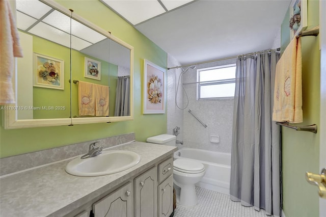 full bathroom with shower / bathtub combination with curtain, toilet, vanity, and tile patterned flooring