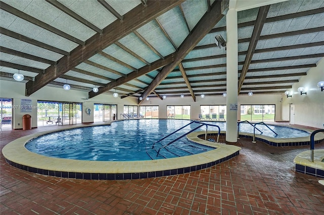 pool with an indoor hot tub