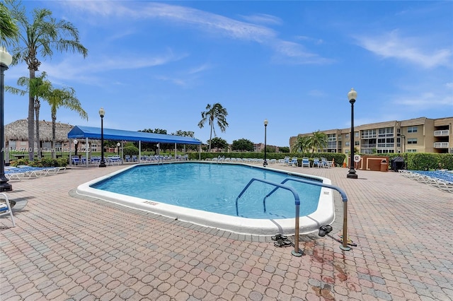 pool featuring a patio area