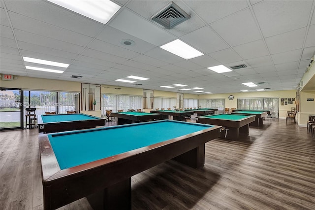 game room with visible vents, a paneled ceiling, wood finished floors, and pool table