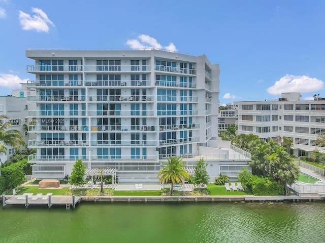 view of building exterior with a water view