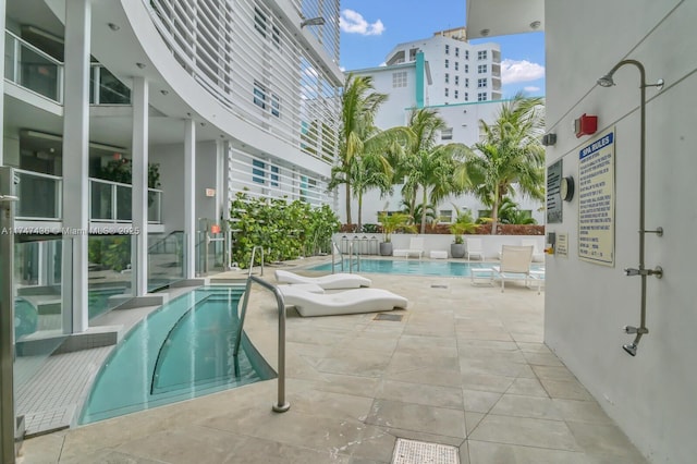 community pool featuring a patio