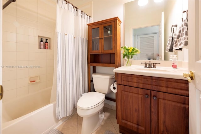 full bathroom with tile patterned flooring, shower / bath combination with curtain, toilet, and vanity