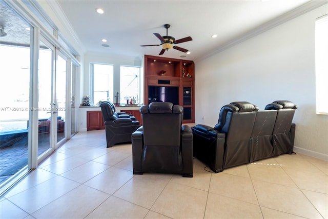 living room with a ceiling fan, baseboards, light tile patterned flooring, recessed lighting, and crown molding