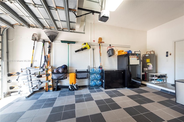 garage featuring fridge, a garage door opener, water heater, and freestanding refrigerator