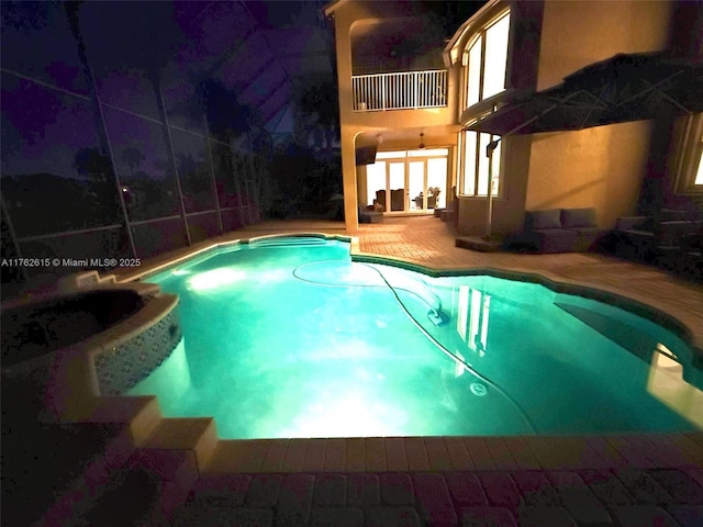 pool with a patio area