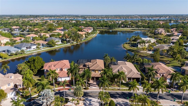 aerial view with a residential view and a water view