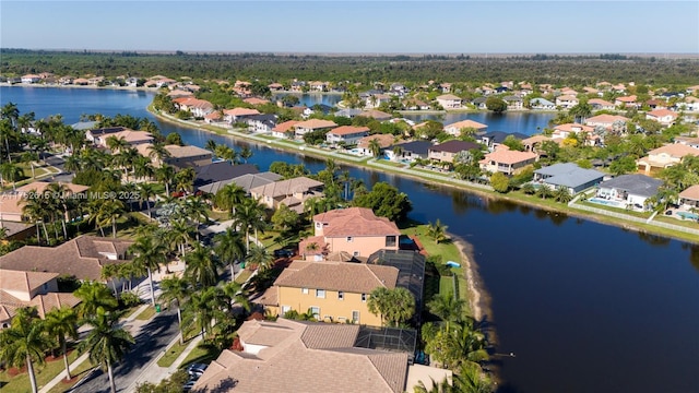 bird's eye view with a residential view and a water view