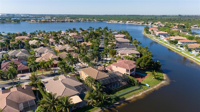 aerial view featuring a residential view and a water view