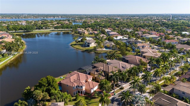 aerial view with a residential view and a water view