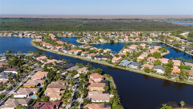 aerial view featuring a residential view and a water view