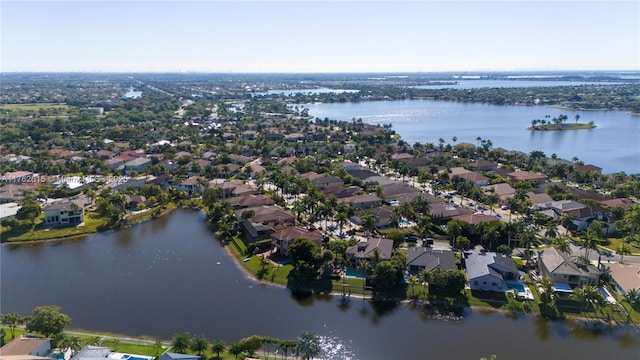 aerial view featuring a residential view and a water view