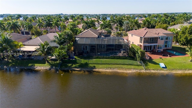 aerial view with a residential view and a water view