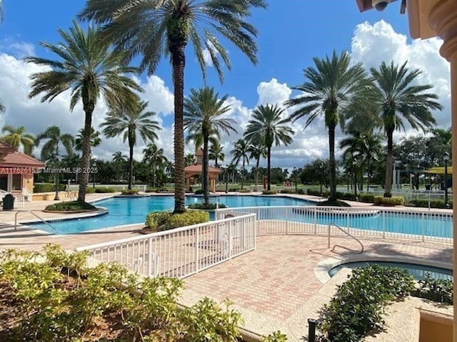 pool with a patio