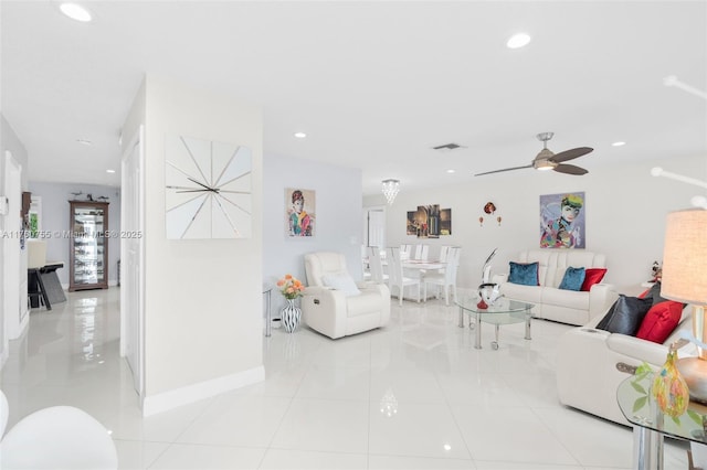 living area featuring visible vents, recessed lighting, light tile patterned flooring, baseboards, and ceiling fan