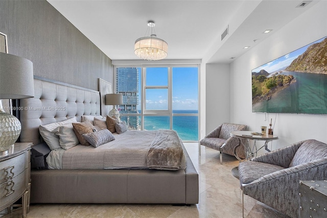 18201 Collins Ave Unit 4404, Sunny Isles Beach, FL 33160 - bedroom with a chandelier and expansive windows