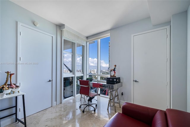 office space with marble finish floor