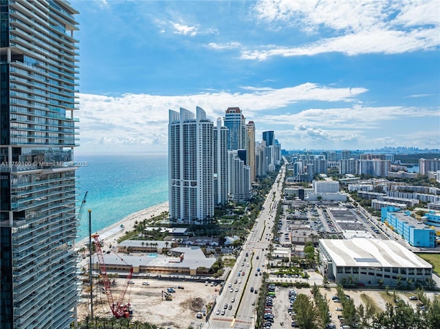 exterior space featuring a view of city and a water view