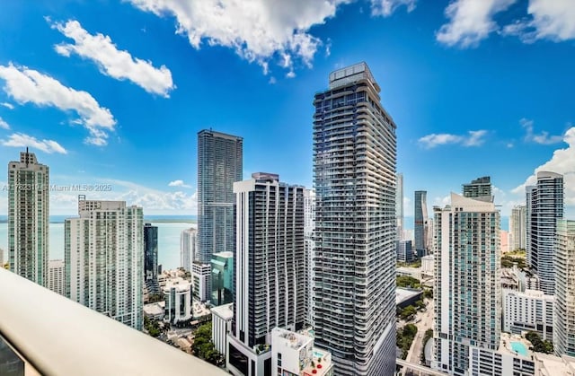 property's view of city with a water view