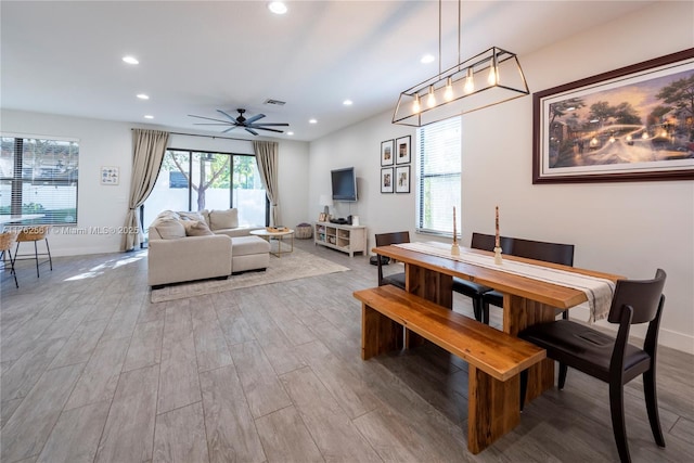 dining room with visible vents, baseboards, recessed lighting, wood finished floors, and a ceiling fan