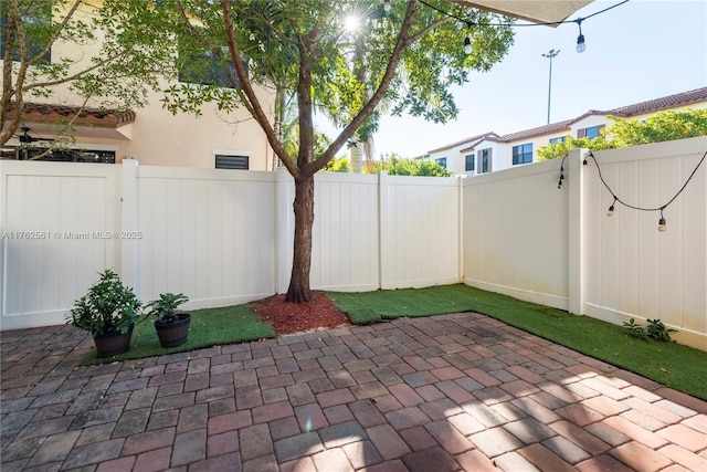 view of patio featuring a fenced backyard