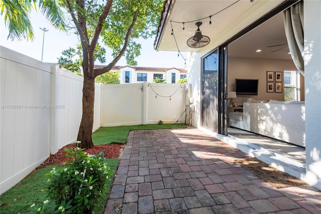 view of patio featuring a gate and a fenced backyard