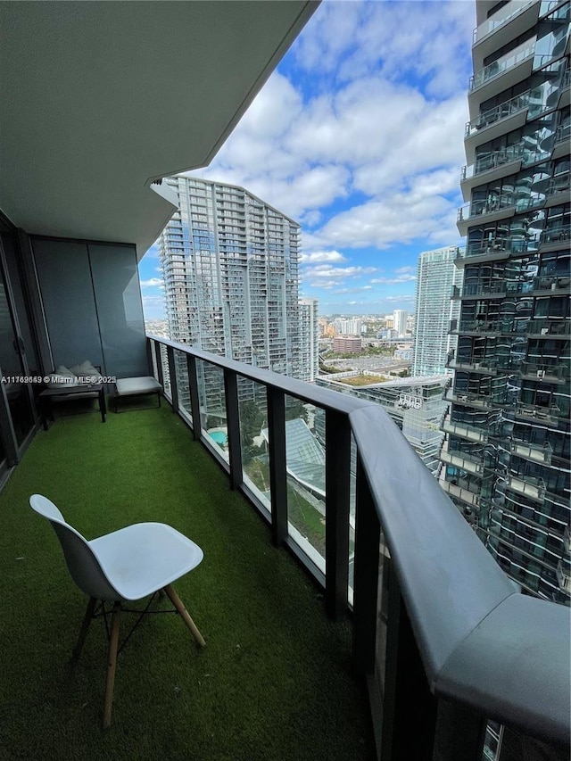 balcony featuring a city view