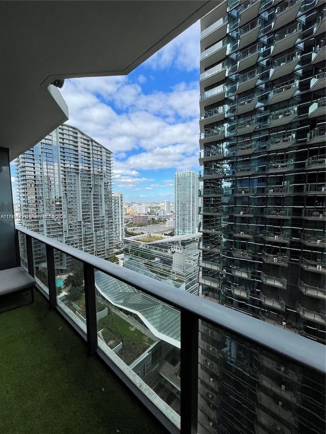 balcony featuring a view of city