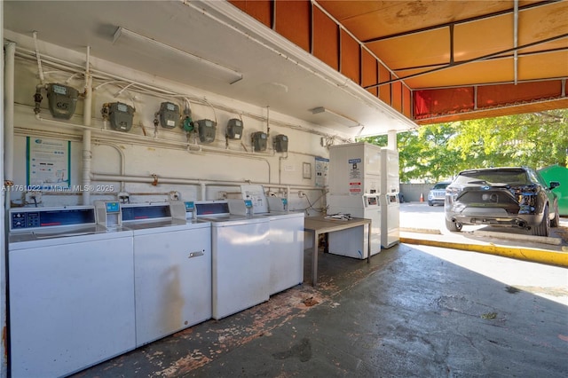 laundry area featuring communal laundry area and washing machine and dryer