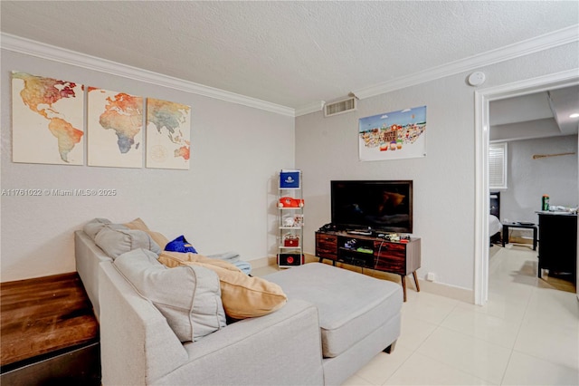 tiled living room with visible vents, a textured ceiling, and crown molding