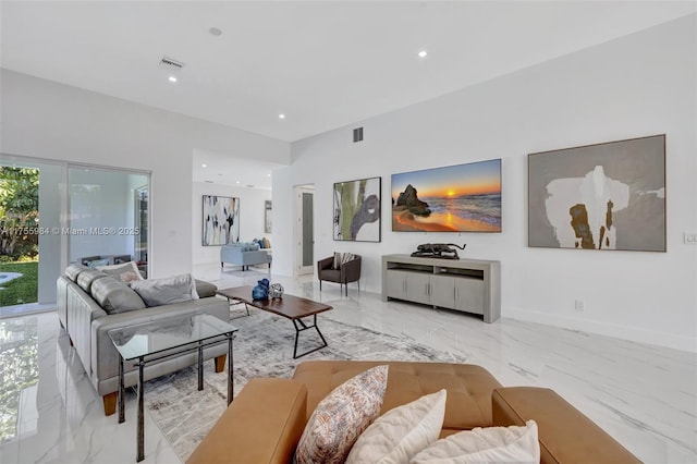 living room with recessed lighting, visible vents, marble finish floor, and baseboards