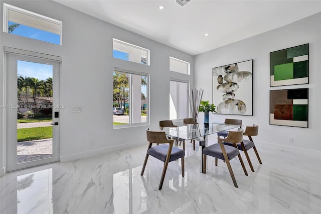 dining room with recessed lighting, visible vents, baseboards, and marble finish floor