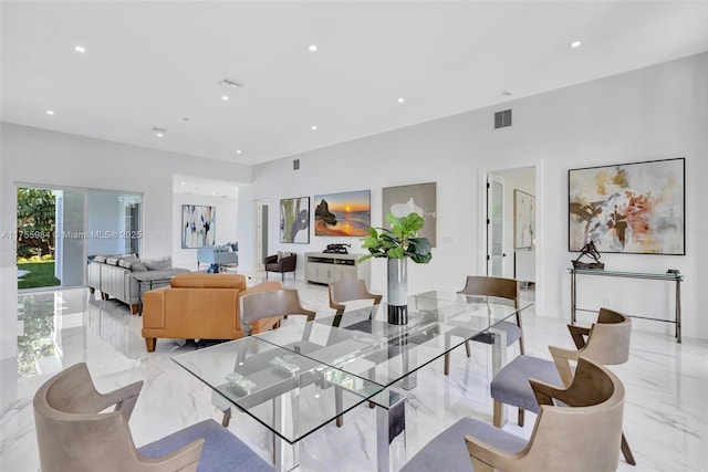 dining room with visible vents, recessed lighting, and marble finish floor