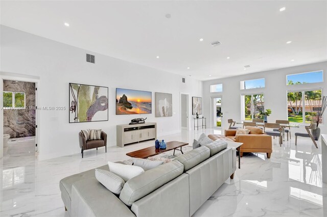 4440 NE 15th Ter, Oakland Park, FL 33334 - living room featuring marble finish floor, visible vents, and recessed lighting