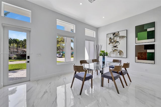4440 NE 15th Ter, Oakland Park, FL 33334 - dining area with marble finish floor, baseboards, visible vents, and recessed lighting