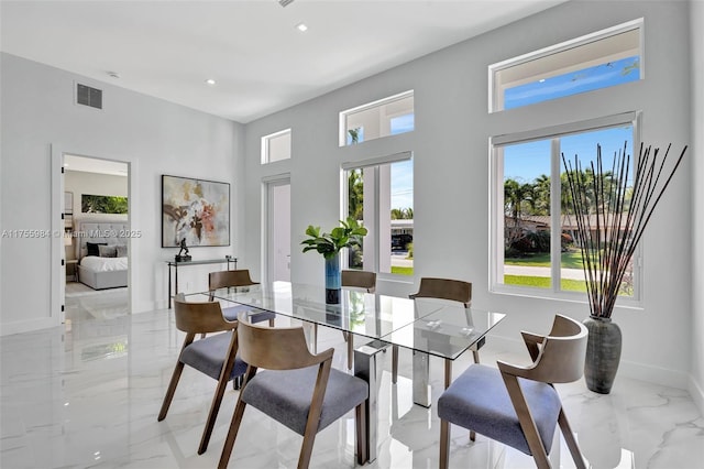 4440 NE 15th Ter, Oakland Park, FL 33334 - dining room featuring visible vents, baseboards, marble finish floor, recessed lighting, and french doors
