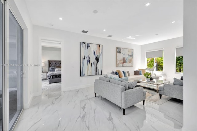 living room with recessed lighting, visible vents, marble finish floor, and baseboards