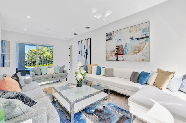 living room with visible vents and recessed lighting